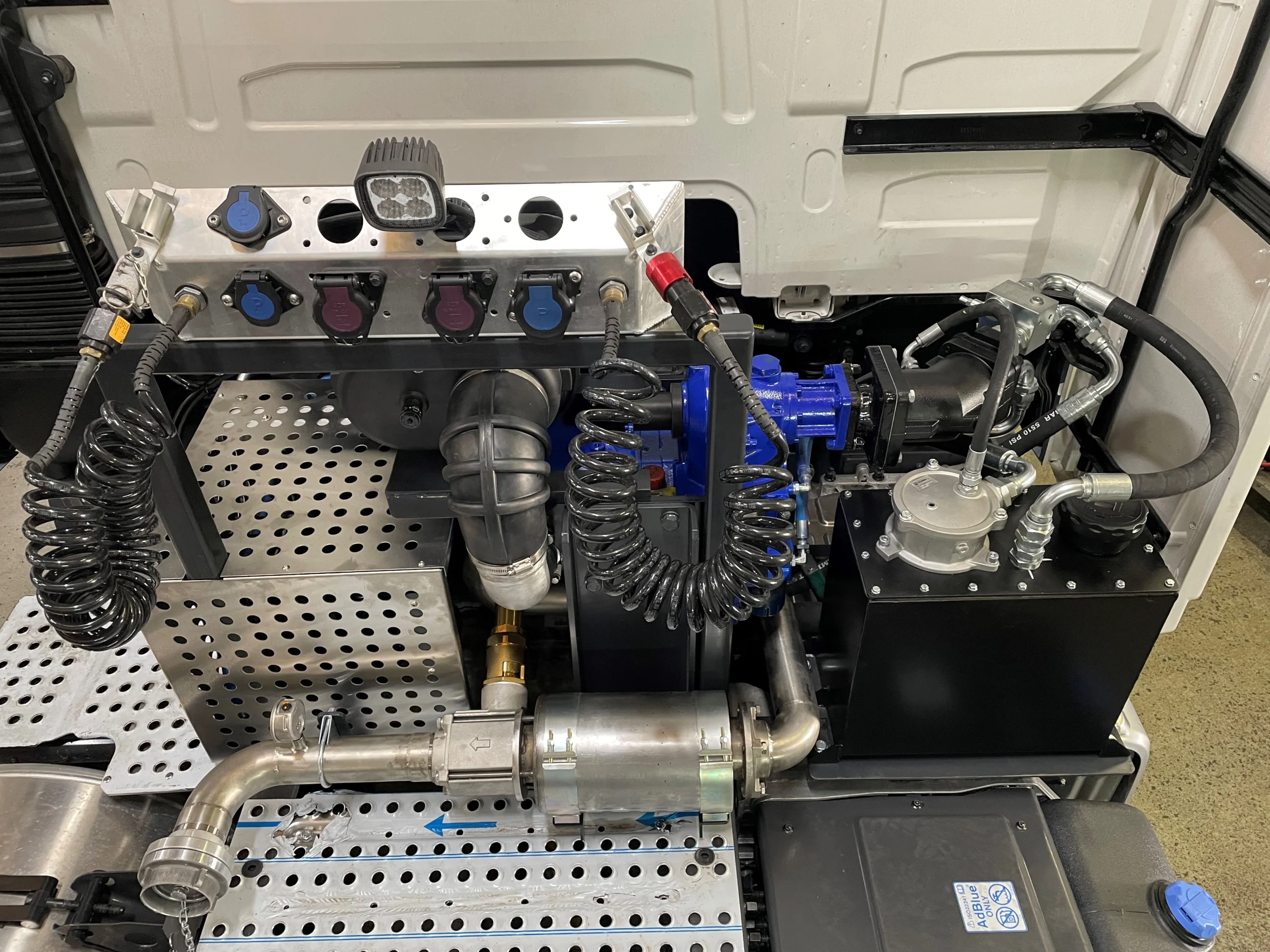 Rear cab mounted powder blower package